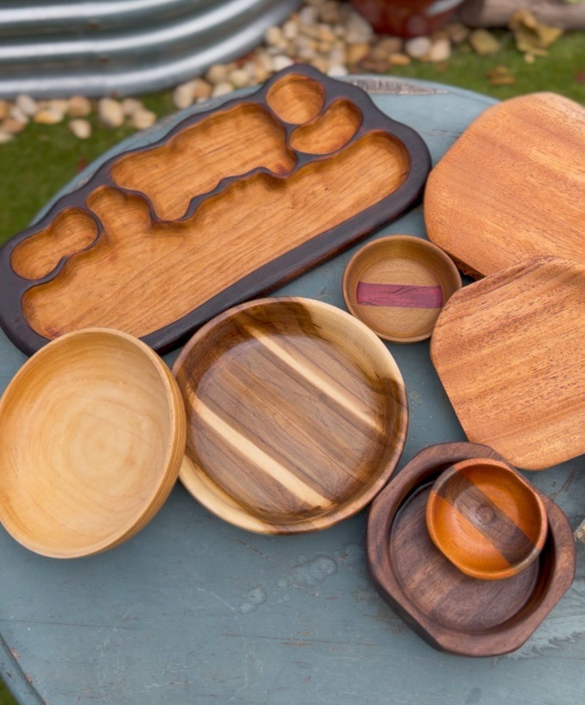 Handcrafted wood home goods including sculptural trays and bowls by Remy’s Studio